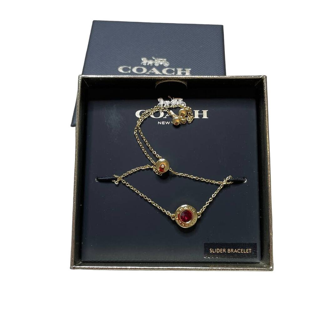 Coach Open Circle Red Stone Slider Gold Tone Bracelet Adjustable Bracelet